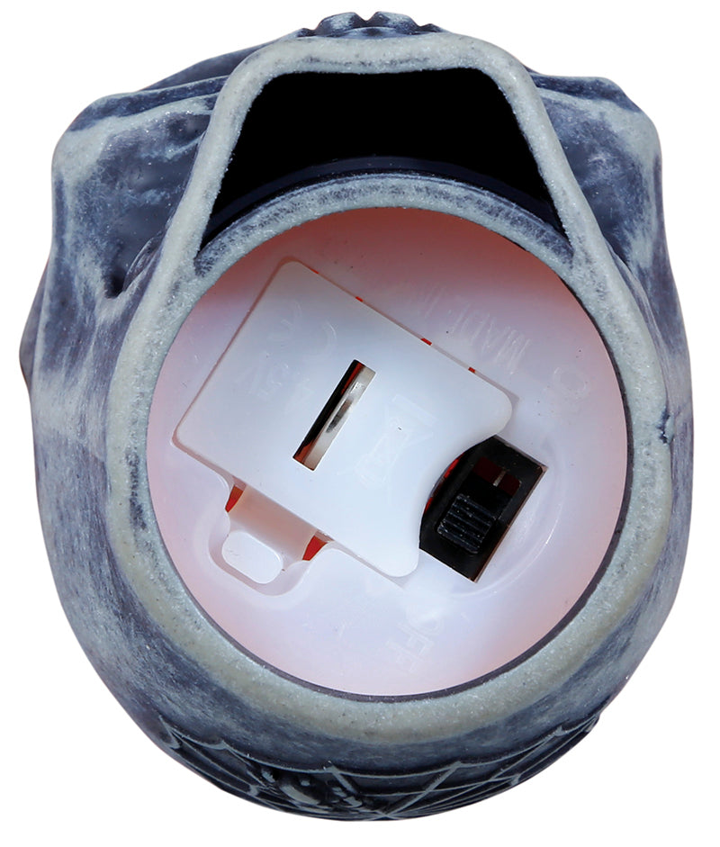 BOX OF 12 SKULL WITH LED CANDLE, 6 CMS.