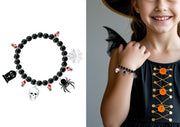 BLACK BRACELET WITH CHARMS